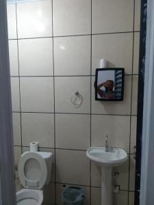 Phòng tắm tại Chácara Pousada Sagui