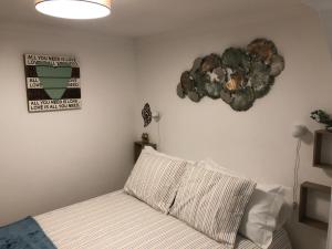 Giường trong phòng chung tại Blue Urban Alfama