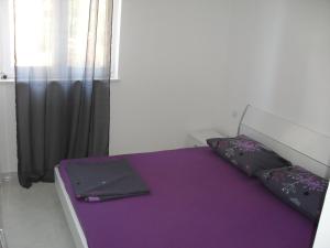 Postel nebo postele na pokoji v ubytování Apartments Govic