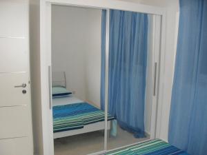Postel nebo postele na pokoji v ubytování Apartments Govic