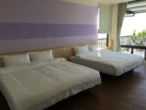 Letto o letti in una camera di Legendary Bed and Breakfast