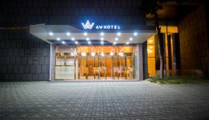 Daegu AW Hotel في دايغو: مبنى عليه لافته