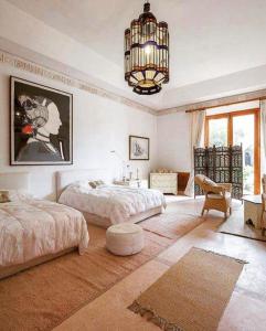 Llit o llits en una habitació de Palais Claudio Bravo