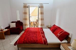 Postel nebo postele na pokoji v ubytování Apartmani Vuljan