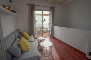 Część wypoczynkowa w obiekcie Casas de Sevilla - Casa Sevillana Harinas26