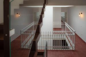 Łóżko lub łóżka w pokoju w obiekcie Casas de Sevilla - Casa Sevillana Harinas26