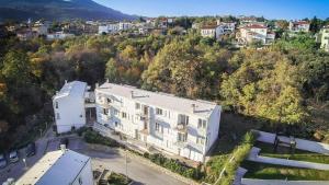 an aerial view of a building in a city at Apartman Tramontana in Opatija