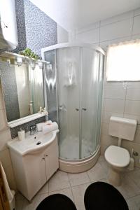 Koupelna v ubytování Apartmani Vuljan