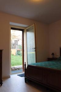 Posteľ alebo postele v izbe v ubytovaní Villa Costanzi: Comfy Apartment Below The Cucco