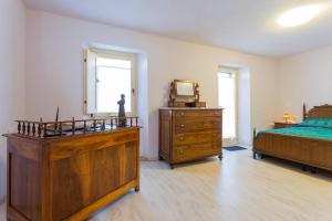 Posteľ alebo postele v izbe v ubytovaní Villa Costanzi: Comfy Apartment Below The Cucco