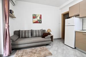 Kuchyň nebo kuchyňský kout v ubytování Apartmani Vuljan