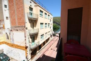 a view from the balcony of a building at Hostal Juventus in Portbou