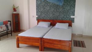 Postel nebo postele na pokoji v ubytování Masha Beach Inn