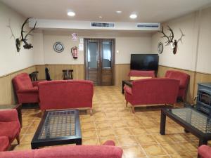 TV a/nebo společenská místnost v ubytování Hotel Sierra de Andujar