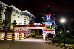 a hotel with a clock tower in front of a building at LEGOLAND(R) Windsor Resort in Windsor