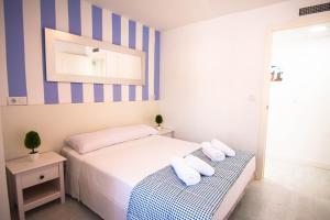 Postel nebo postele na pokoji v ubytování Villas Guzman - Belvic