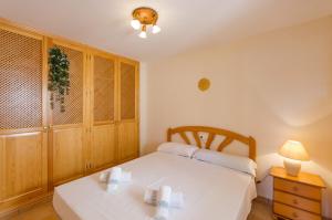 Postel nebo postele na pokoji v ubytování Villas Guzman - Carlos + 9 fotografií