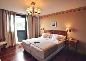 Cama o camas de una habitación en Quinta de San Amaro Rias Baixas