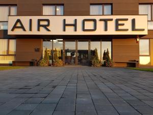 an office building with an air hotel sign on it at Air Hotel in Karmėlava