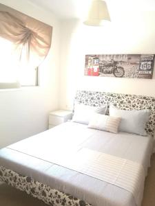 Кровать или кровати в номере The little palace next to the sea