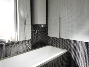 Ein Badezimmer in der Unterkunft Künstlerhaus Arthotel
