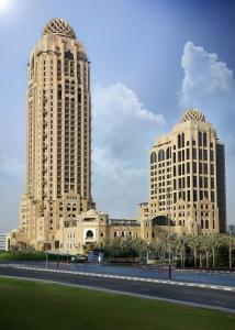 two tall buildings with a road in front of them at Arjaan by Rotana - Dubai Media City in Dubai