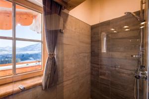 Kúpeľňa v ubytovaní Chalet Apartment Obermanzl