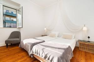 Postelja oz. postelje v sobi nastanitve Renovated Apartments in Central Lisbon