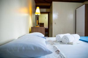 Postel nebo postele na pokoji v ubytování OM B&B + Spa + 37 fotografií