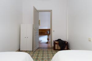 Posteľ alebo postele v izbe v ubytovaní Casa Cosi - Mallorca 2