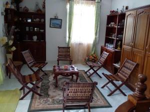 Posedenie v ubytovaní Ylang Ylang Garden Home