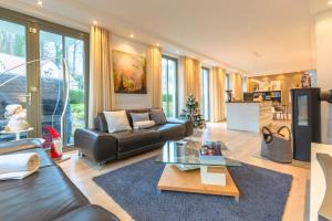 Η κουζίνα ή μικρή κουζίνα στο Luxusferienwohnung Seebrise*****