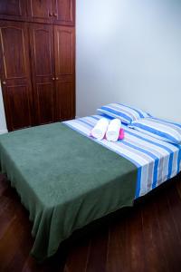Postel nebo postele na pokoji v ubytování OM B&B + Spa