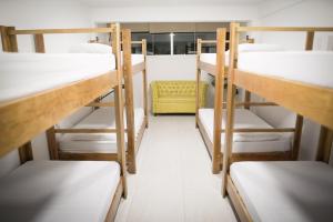 Postel nebo postele na pokoji v ubytování Downtown Hostel Chetumal