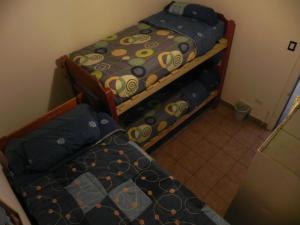 Postel nebo postele na pokoji v ubytování Lemuria Hostel