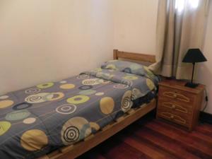 Postel nebo postele na pokoji v ubytování Lemuria Hostel