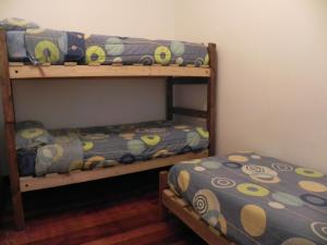 Postel nebo postele na pokoji v ubytování Lemuria Hostel