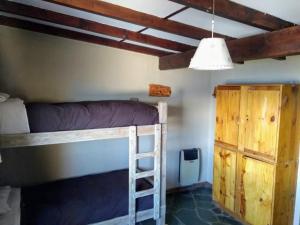 Postel nebo postele na pokoji v ubytování Bariloche Hostel