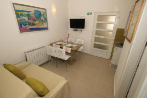 TV a/nebo společenská místnost v ubytování Apartments Aurelia