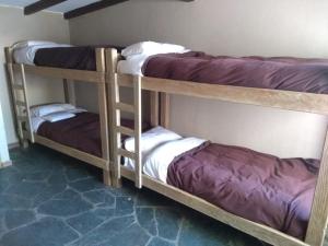 Postel nebo postele na pokoji v ubytování Bariloche Hostel