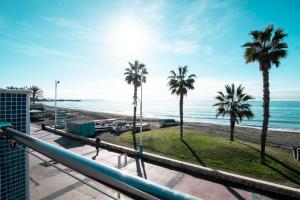 a view of the beach from the balcony of a condo at Letmalaga Cremades Beach in M&aacute;laga