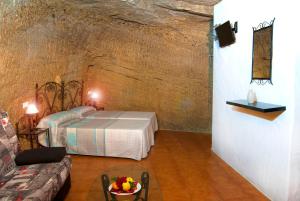 Postel nebo postele na pokoji v ubytování Hostal Batato