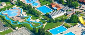 an aerial view of a resort with several pools at Terme Čatež Apartma Nine in Čatež ob Savi