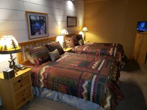 Llit o llits en una habitació de Willard Munger Inn