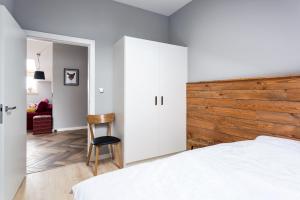 Posteľ alebo postele v izbe v ubytovaní Apartament DOMANIS z widokiem na góry