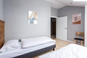 Posteľ alebo postele v izbe v ubytovaní Apartament DOMANIS z widokiem na góry
