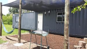 Um jardim no exterior de Complejo Containers DF