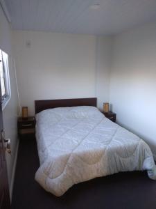 Uma cama ou camas num quarto em Complejo Containers DF