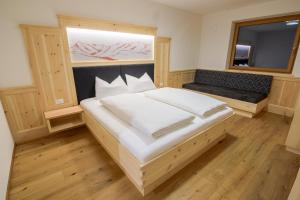 Tempat tidur dalam kamar di Residence Stefansdorf