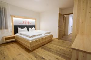 A bed or beds in a room at Residence Stefansdorf